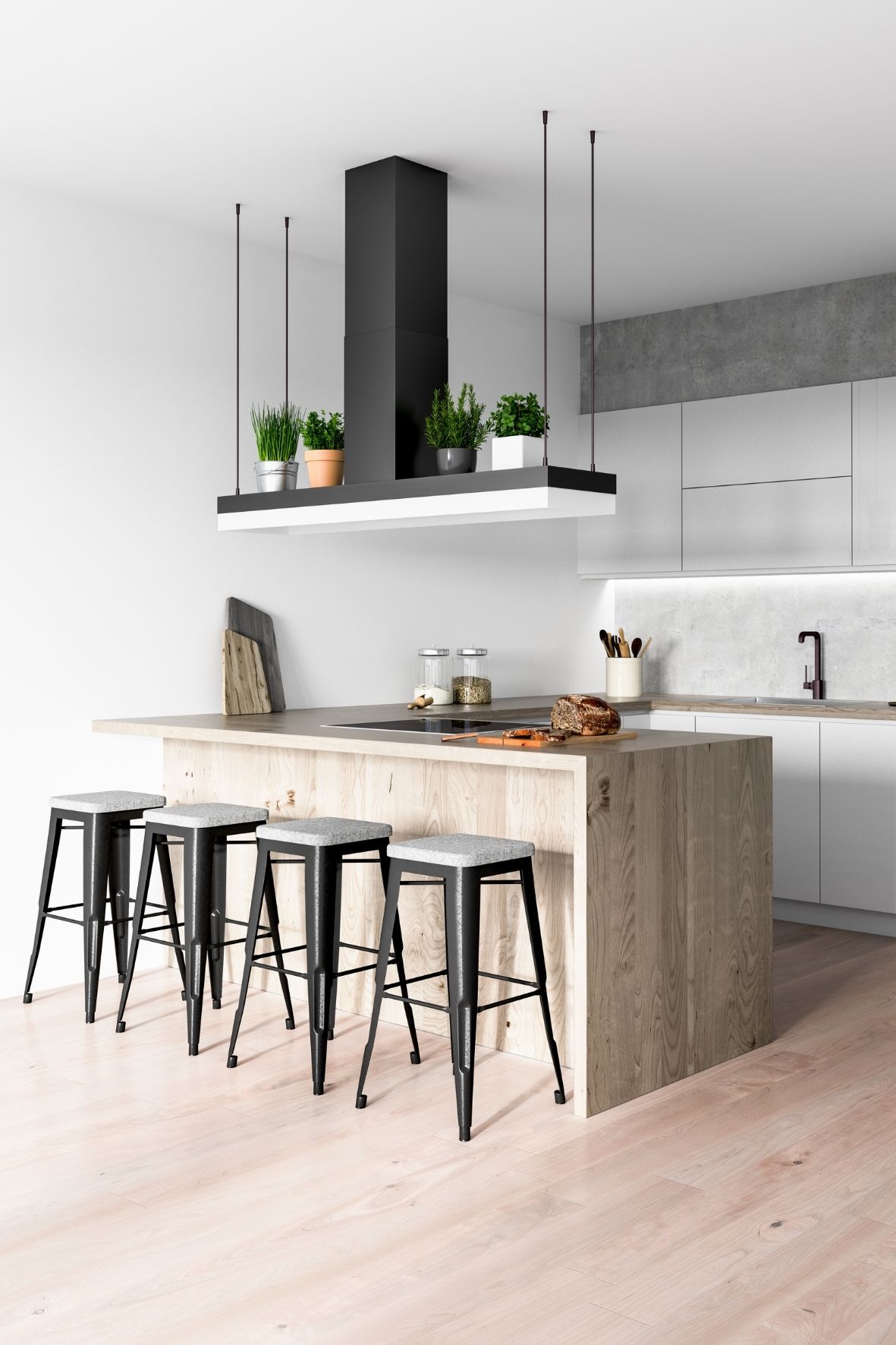 Cuisine avec grand îlot en pierre, luminaires suspendus et espace repas ouvert dans une résidence à Saint-Odilon-de-Cranbourne